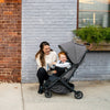 Woman and Toddler using Uppabay Stroller Minu V2 in Greyson