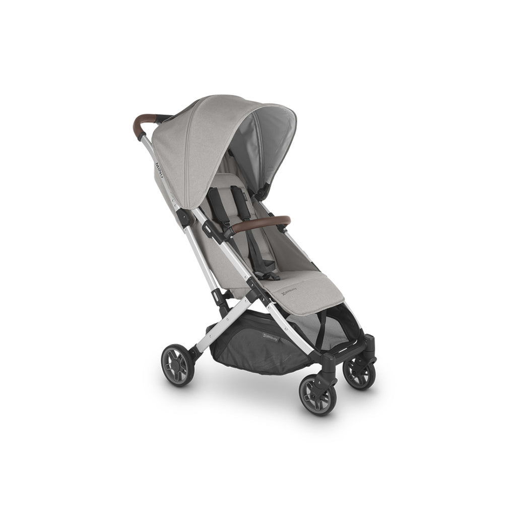 Right side of Uppababy stroller in light grey with partial sunshade