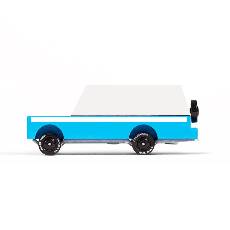 A Candylab Toys Blue Mississippi Mule wooden car for children, designed for pretend travel and exploration.