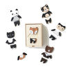 Wee Gallery Mix & Match Animal Tiles Wooden Dress Up Play Set. Black, white, and brown wooden animal pieces. Animals included are a cat, panda, fox, bear, owl, and a french bull dog. Each animal is separated into three pieces.