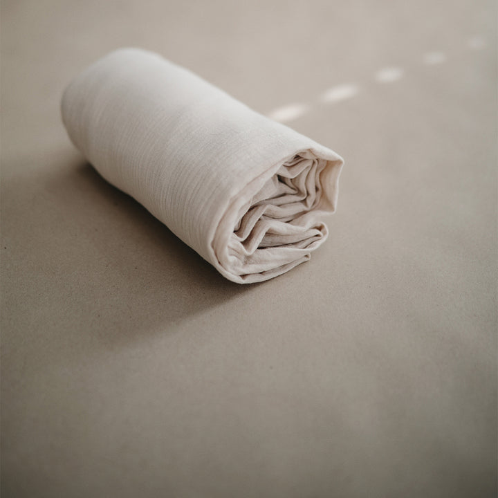 Mushie Crib Sheets made with eco-conscious materials perfect for your baby and the environment