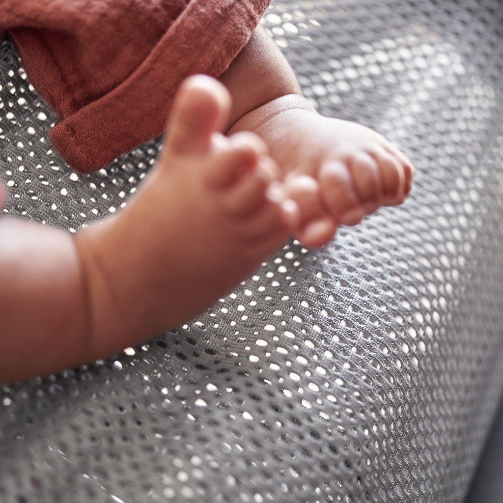 babies feet against fabric BabyBjorn bouncer bliss grey mesh