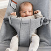 infant resting in baby bjorn bouncer bliss light grey jersey