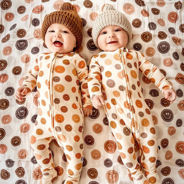 Huggalugs Oatmeal Peak Knit Beanie modeled on infants.