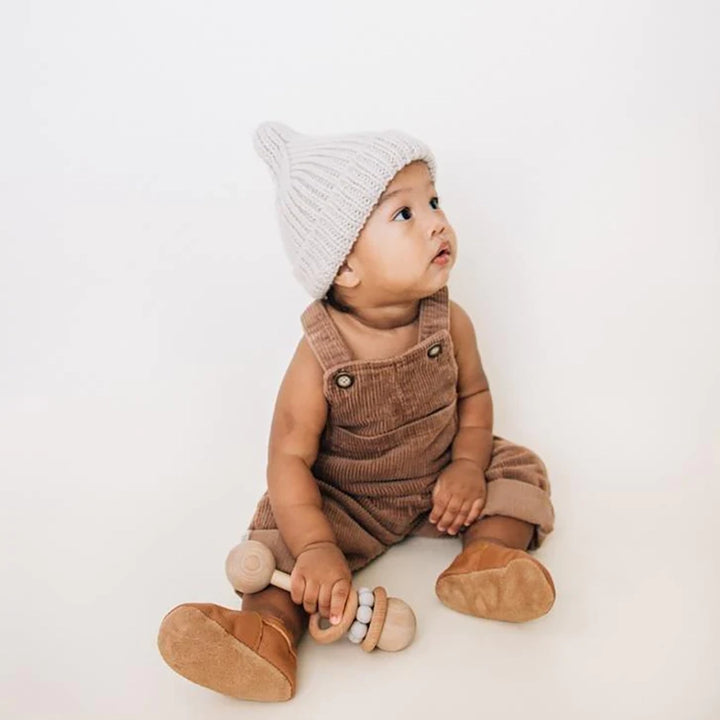 Huggalugs Oatmeal Peak Knit Beanie modeled on toddler.