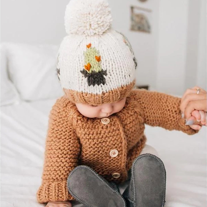 Huggalugs Pecan Garter Stitch Cardigan Sweater modeled on infant.