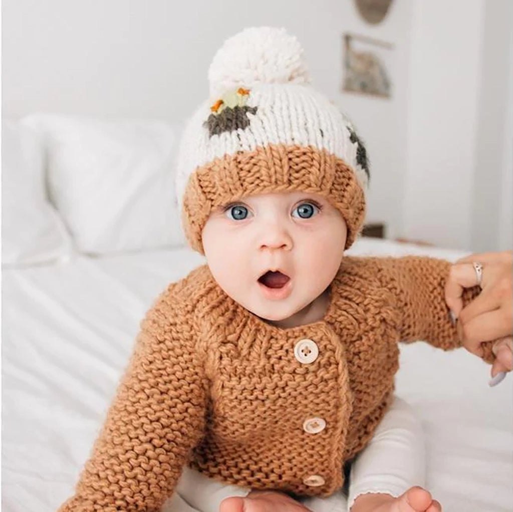 Huggalugs Pecan Garter Stitch Cardigan Sweater modeled on infant.