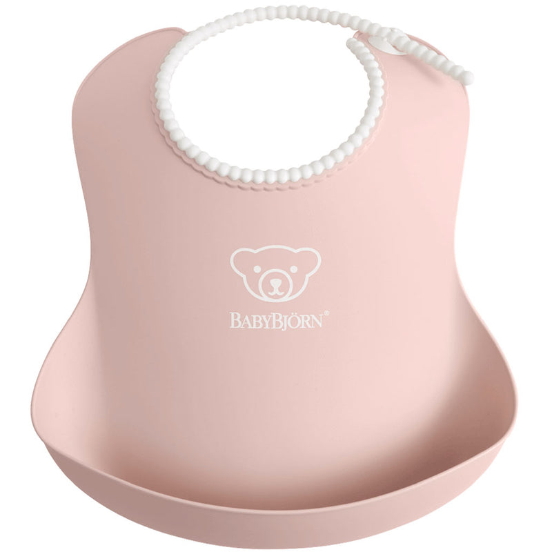 BabyBjorn baby bib in powder pink for keeping baby clothes clean and dry 