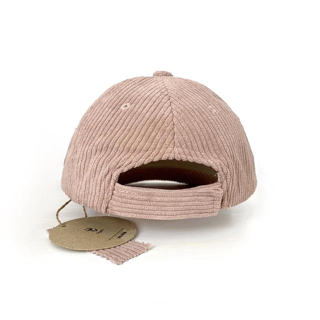 Mrs Ertha Blush Liam Cap Infant & Toddler Corduroy Baseball Cap. Pale pink children's baseball cap. Back view with tags attached, showing the adjustable strap.