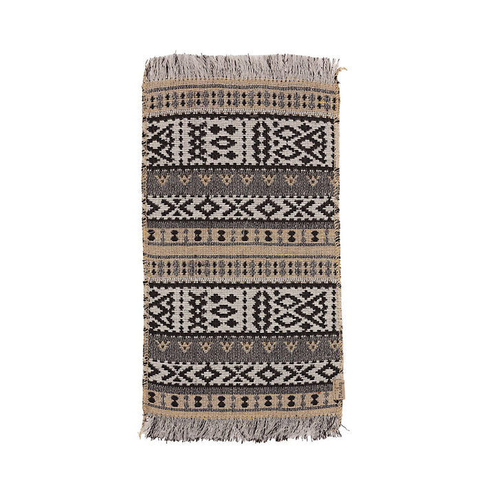 Complete any dollhouse with the Maileg Miniature Rug in Beige, a perfect dollhouse accessory for Maileg furniture sets.