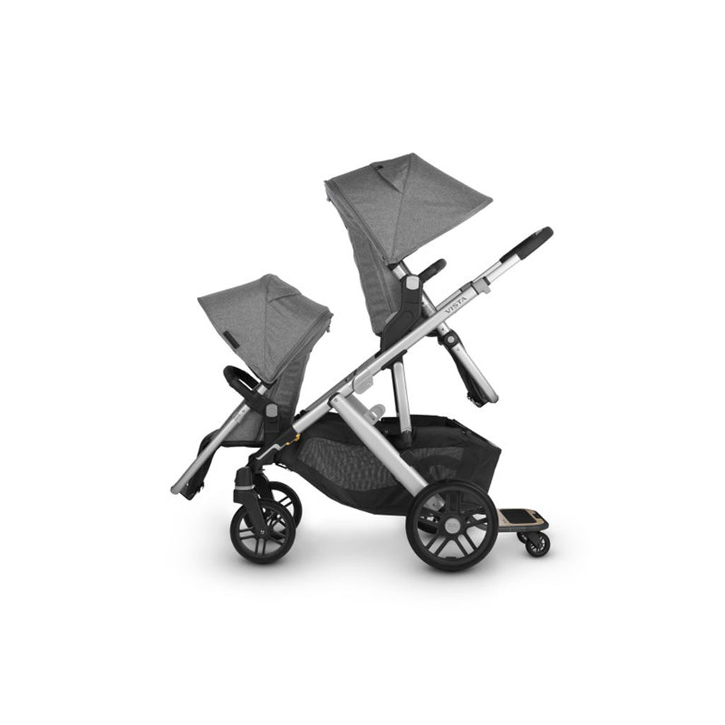 Uppababy VISTA V2 Stroller with Grey Rumble seats and a sibling board