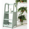 Dadada Sage Toddler Tower Children's Nursery Furniture. In room with plants and watering can