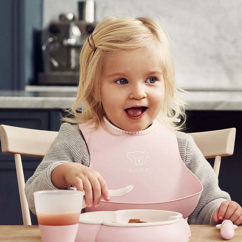 lifestyle_3, BabyBjorn Powder Pink Soft Bib Baby BPA-Free Feeding Accessory child eating 