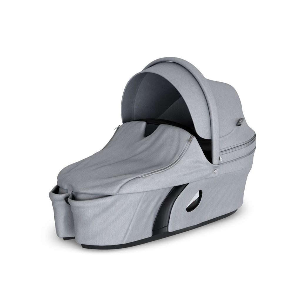 stokke xplory v6 secure flat protective carry cot hard shell height adjustable breathable exceptional ventilation extended canopy grey melange
