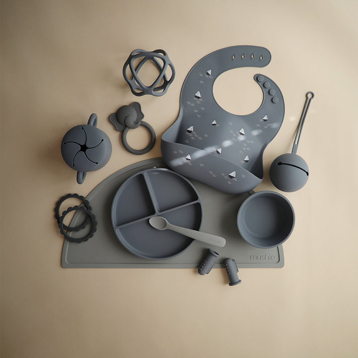 Mushie Silicone Placemats in Stone Neutral stone tones providing a clean and calming mealtime atmosphere