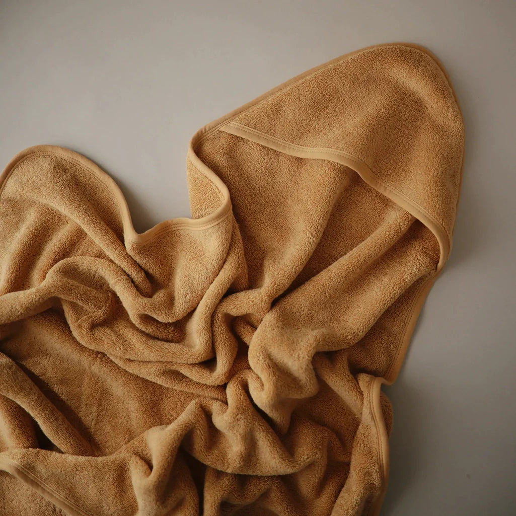 Mushie Baby Towel with Hood designed for easy and quick drying after bath time