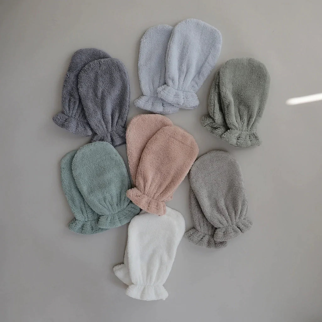 Baby Bath Products that include gentle bath mitts and towels for a soothing experience