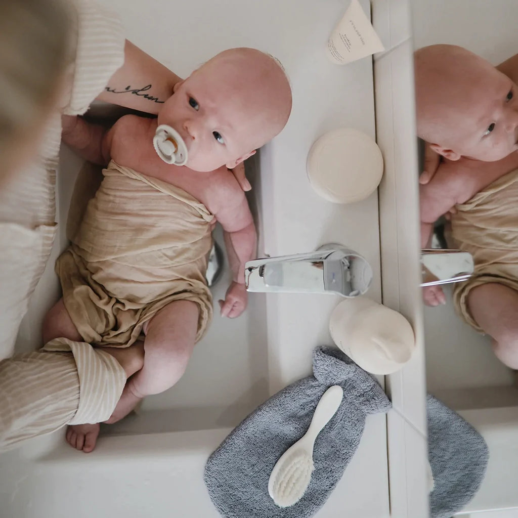 Best Baby Bath Products for your little one featuring soft eco-friendly bath mitts