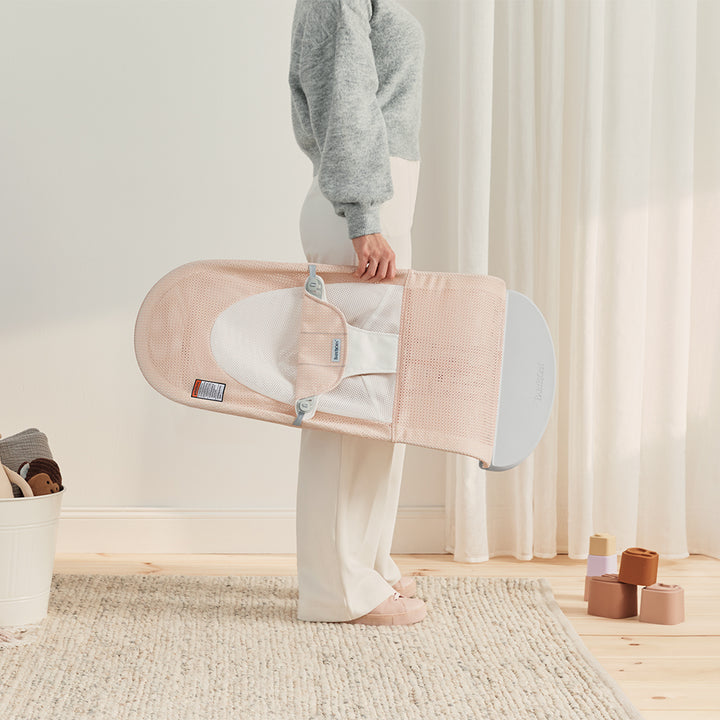 collapsible baby bjorn bouncer balance in pink and white mesh