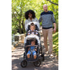Parents walking with Uppababy Double Stroller