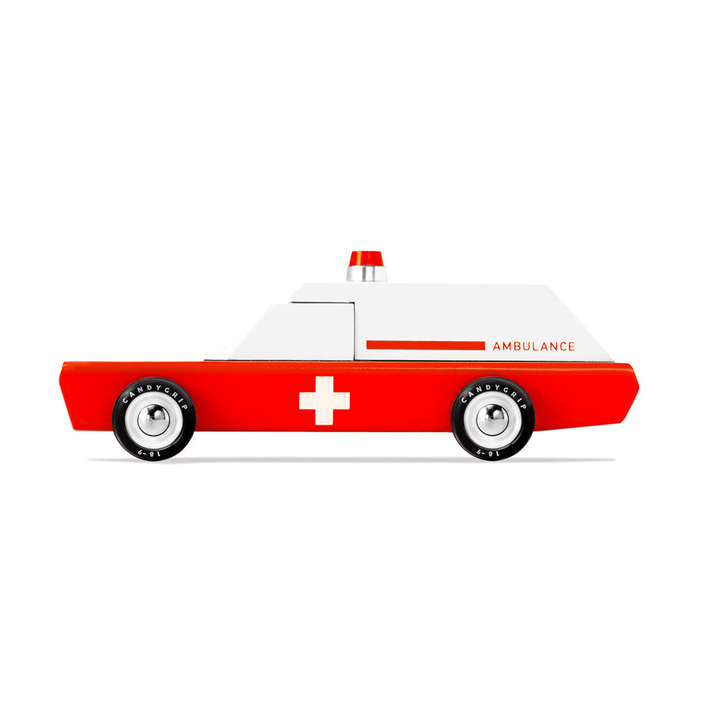 Candylab's red ambulance wagon, a classic wooden play vehicle.