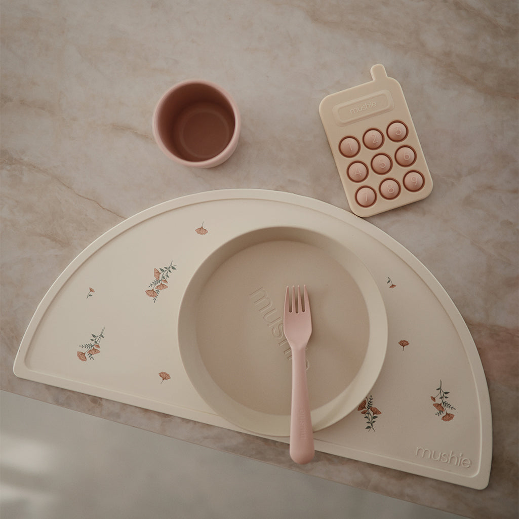 Mushie Placemats in Pink Flowers Soft and delicate floral prints for a calming mealtime atmosphere