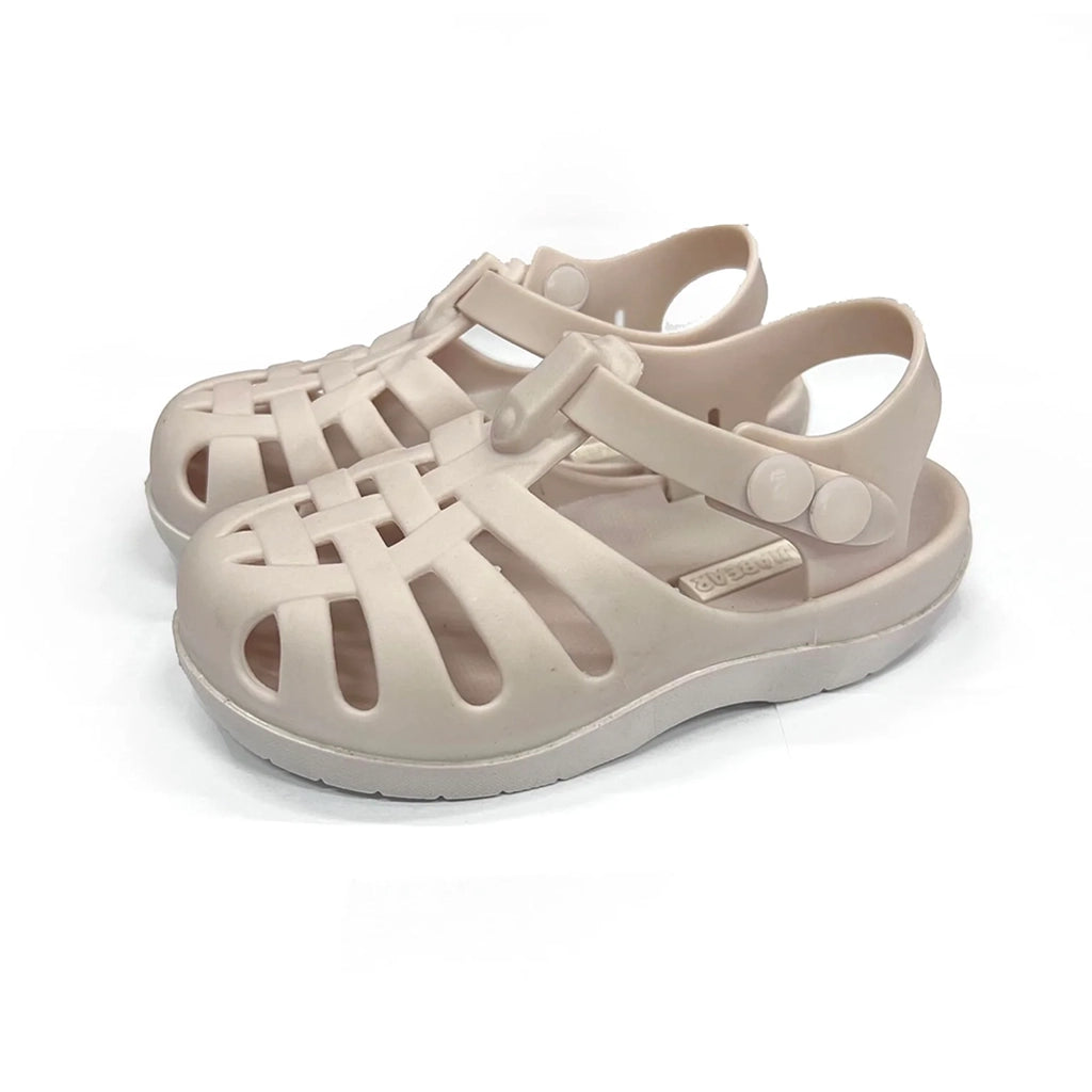 Mrs Ertha Coconut Milk Floopers Children's Silicone Summer Sandals. Off-white silicone sandals with two button strap and a lattice pattern for air flow.